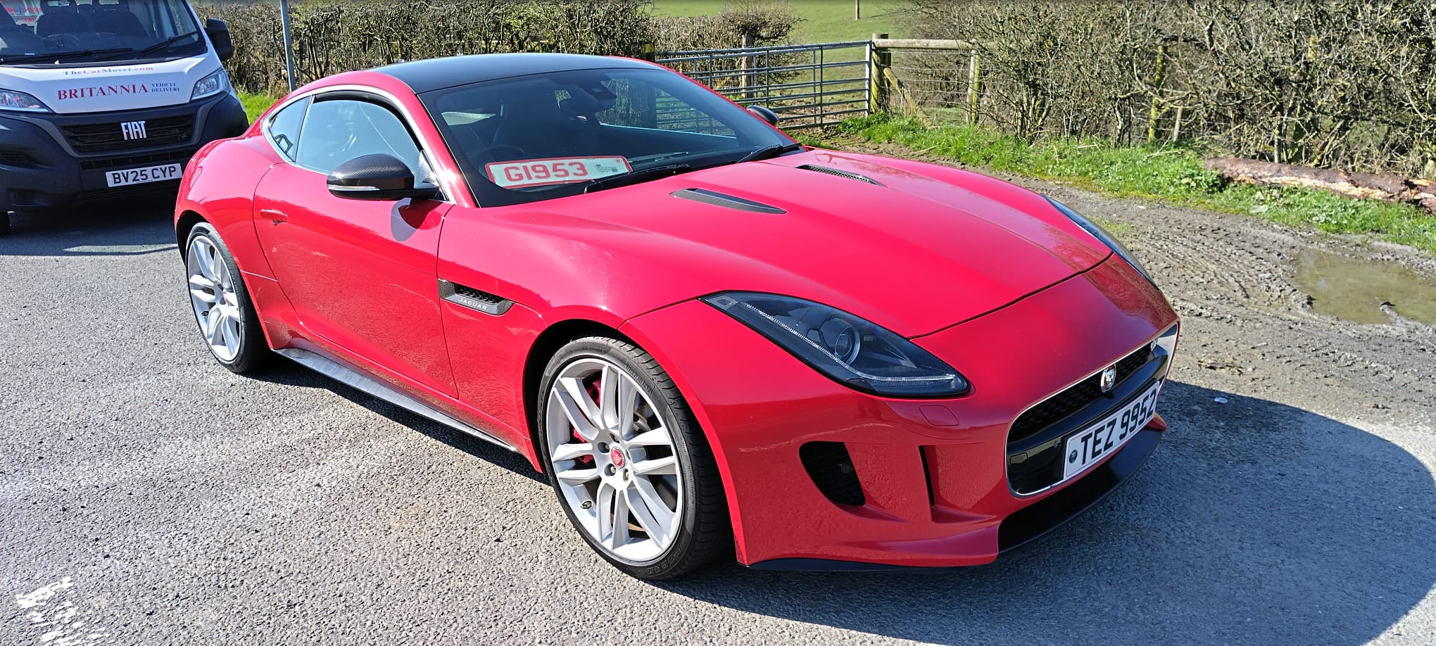 Tony with a red Jaguar F-Type